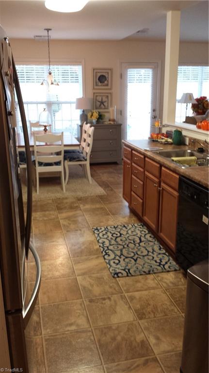 109 Brae Ridge Lane King, NC 27021 - Photo 2 of 10 kitchen with large pantry and laundry area
