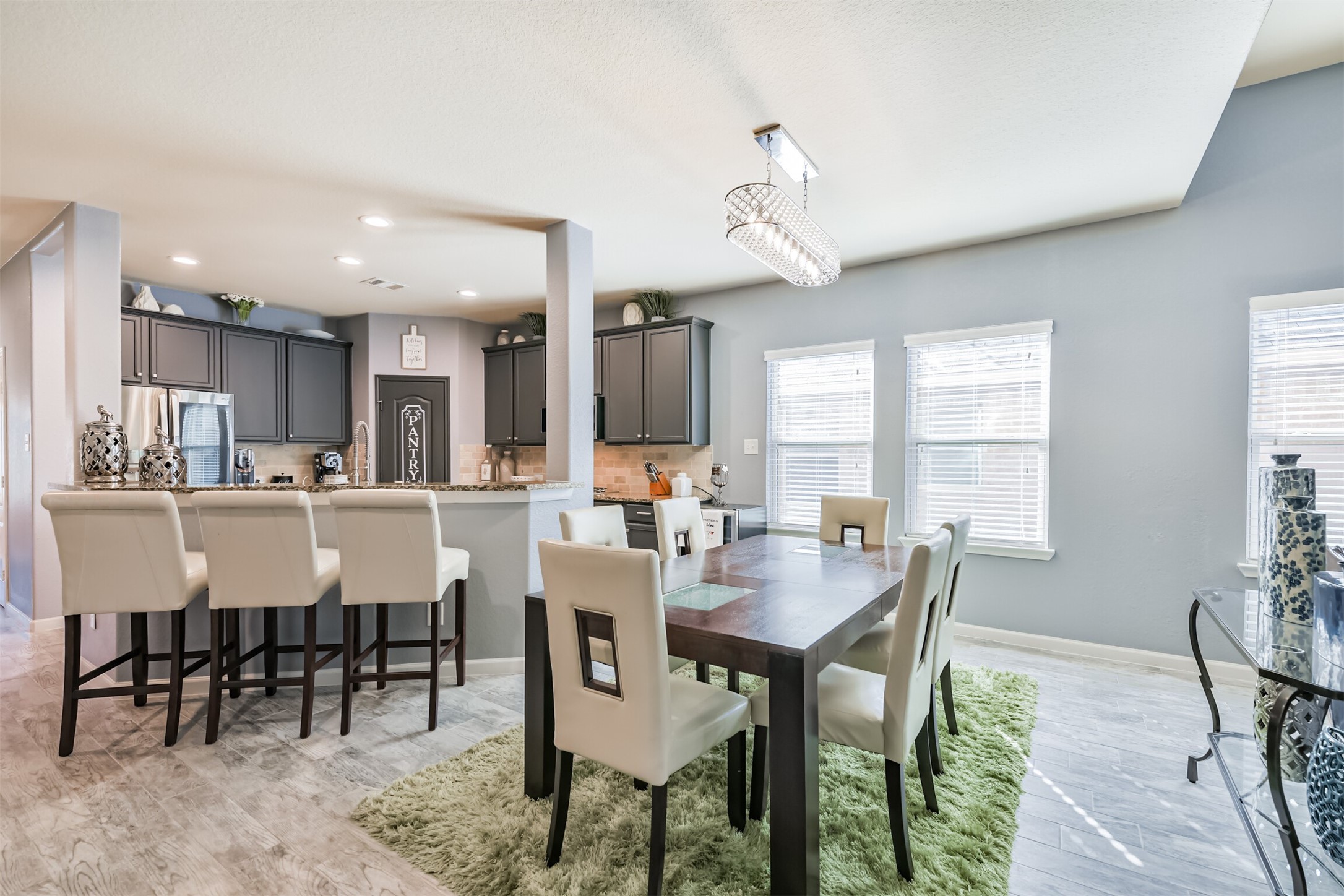 24047 Schults Meadow Lane Spring, TX 77389 - Photo 10 of 47 a view of a dining room and livingroom view