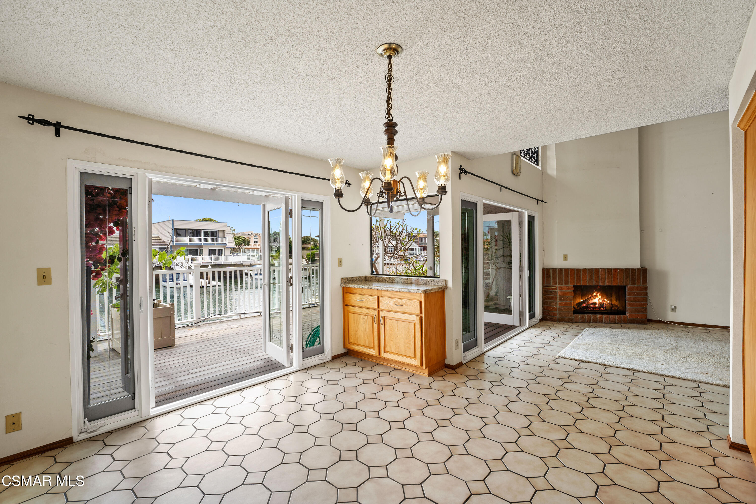 4512 Falkirk Bay Oxnard, CA 93035 - Photo 12 of 40 a view of a kitchen with a refrigerator and a sink