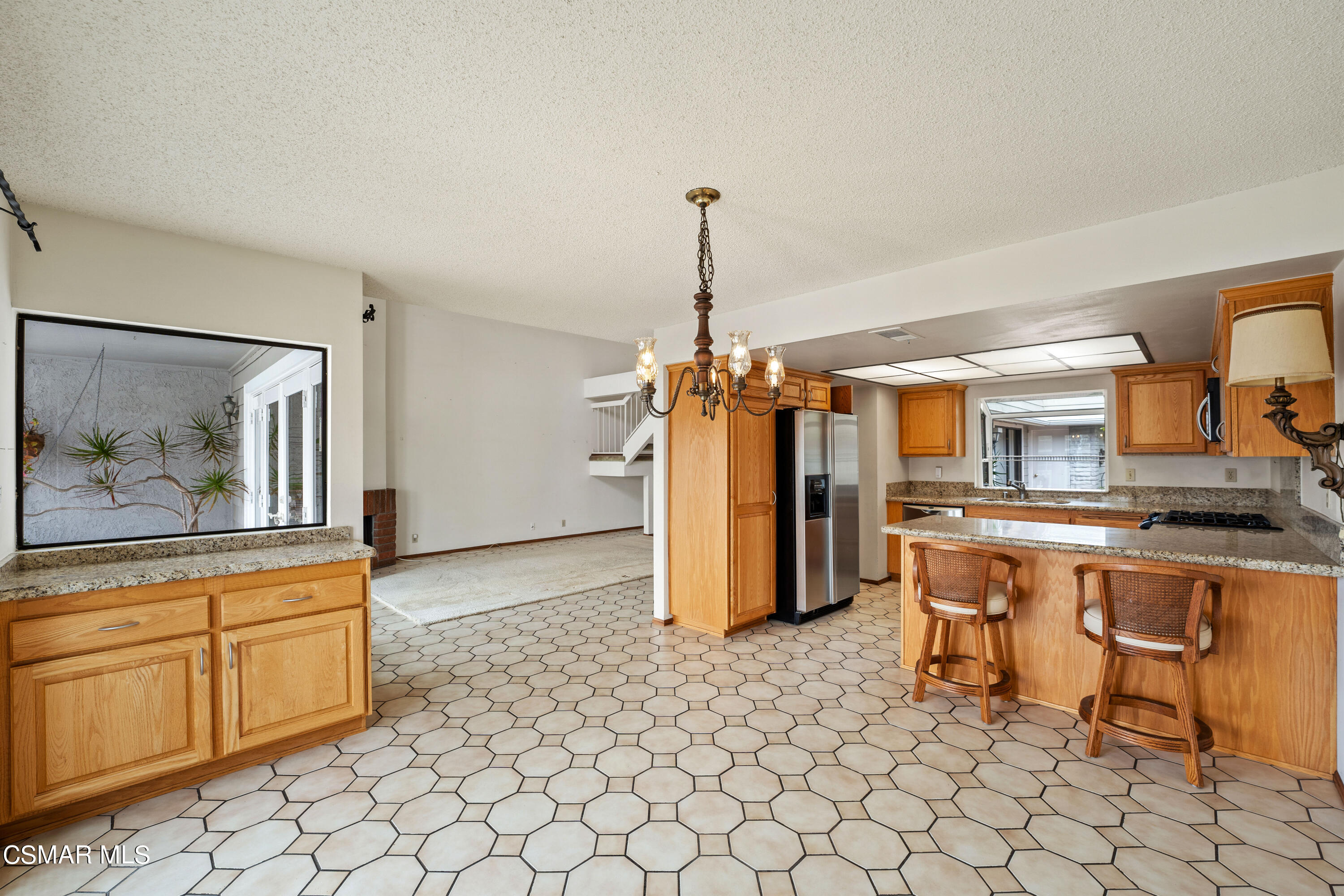 4512 Falkirk Bay Oxnard, CA 93035 - Photo 13 of 40 a kitchen with a sink and cabinets