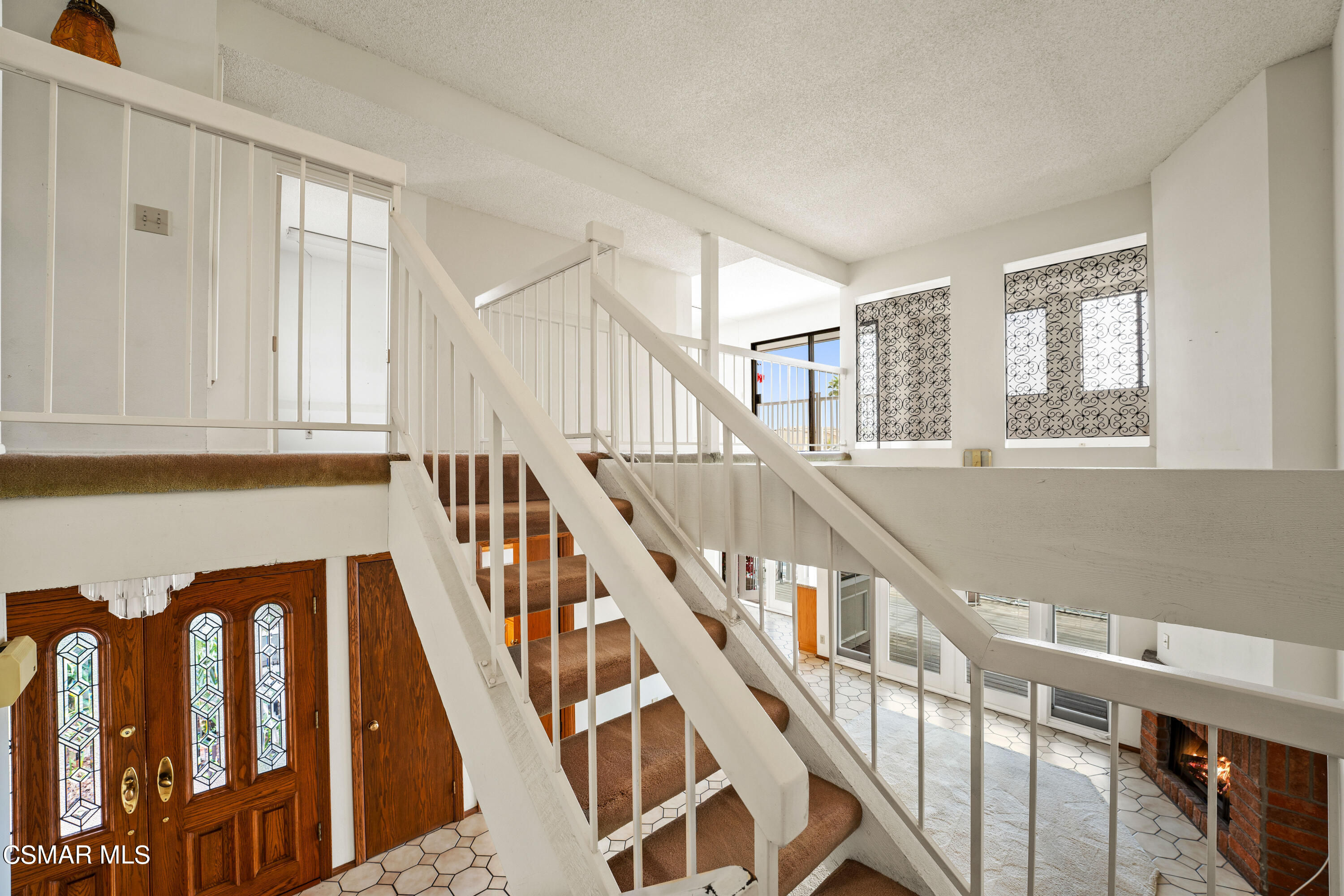 4512 Falkirk Bay Oxnard, CA 93035 - Photo 25 of 40 a view of entryway with wooden floor and stairs