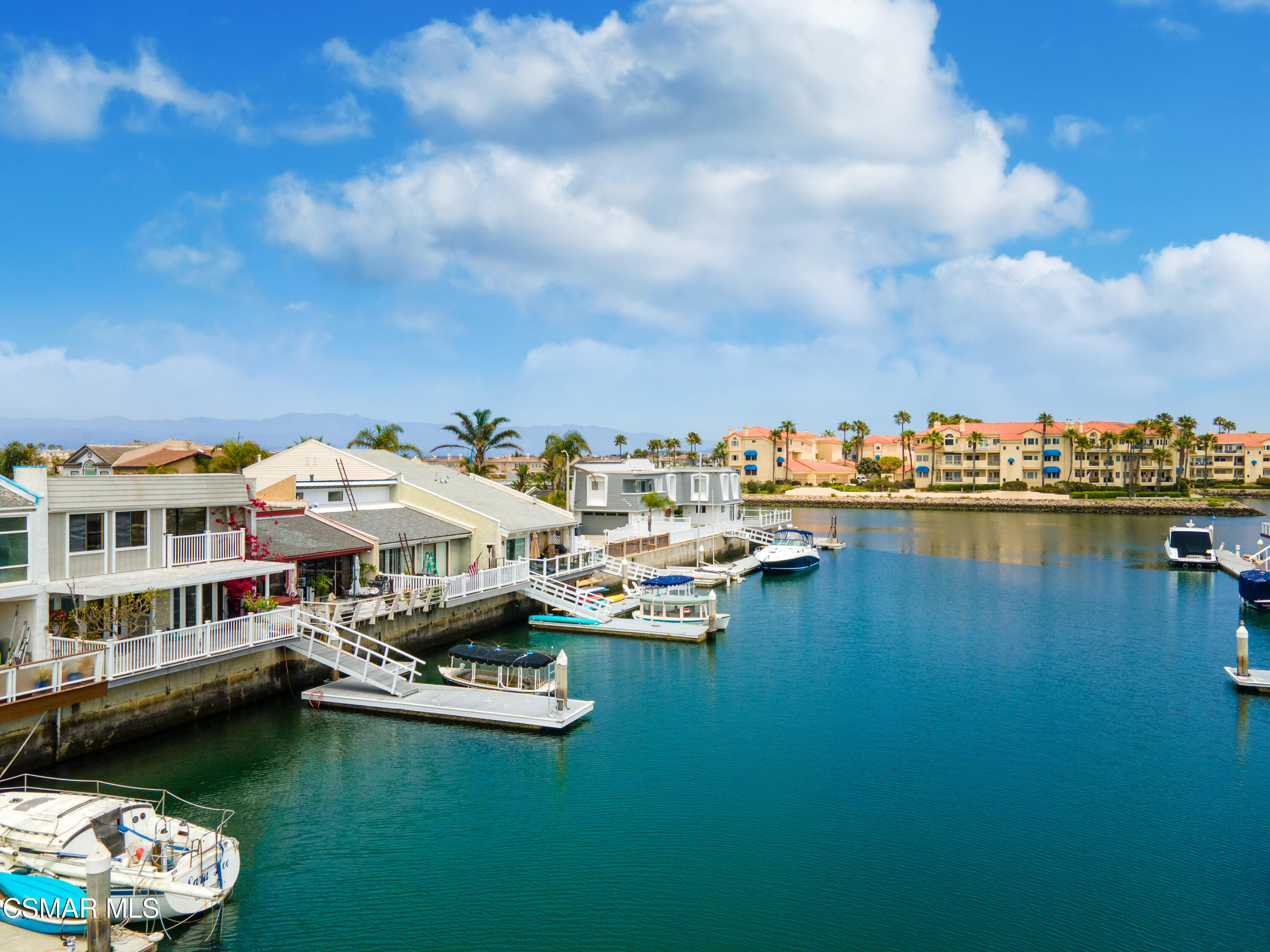4512 Falkirk Bay Oxnard, CA 93035 - Photo 3 of 40 a car parked in the middle of a lake