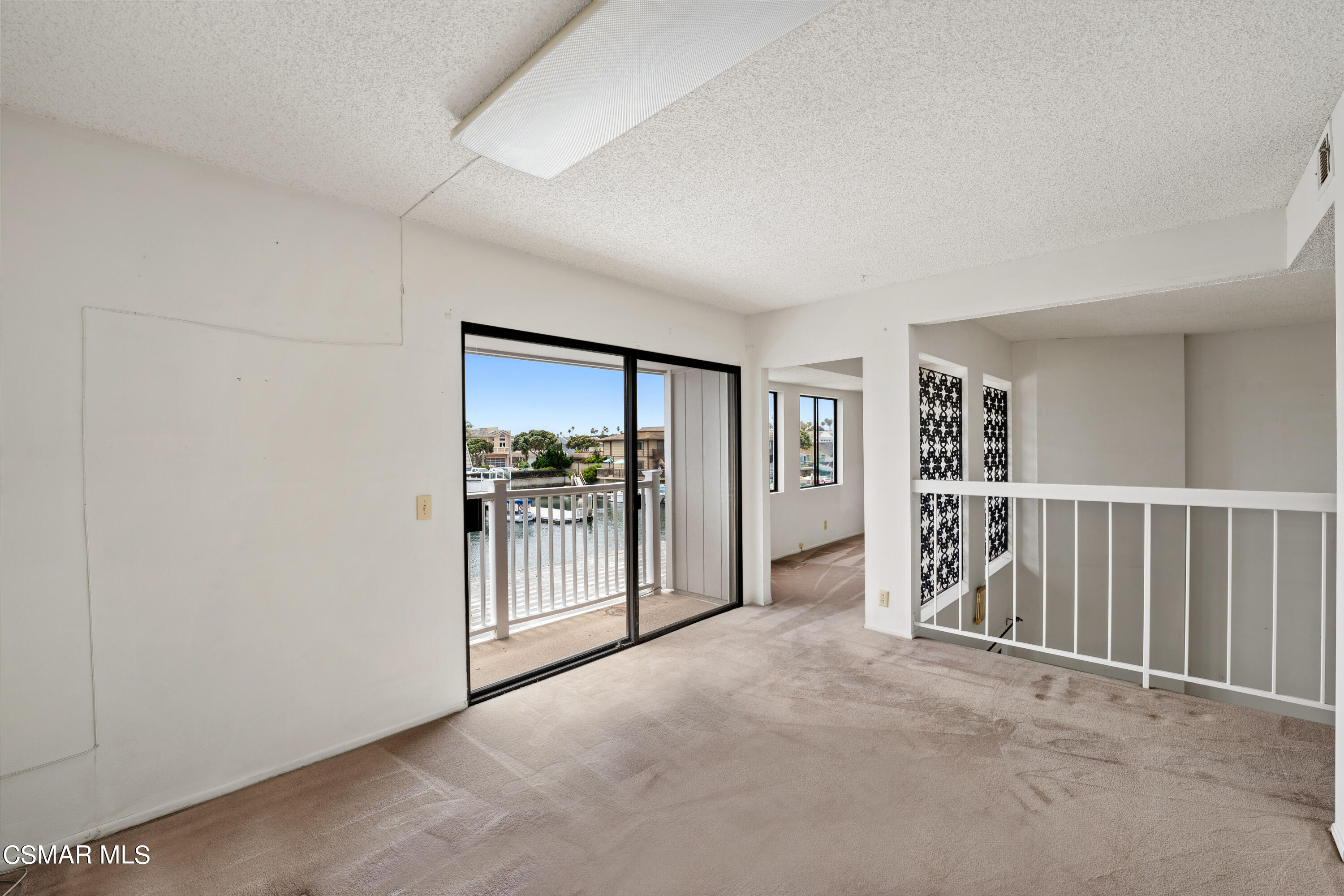 4512 Falkirk Bay Oxnard, CA 93035 - Photo 31 of 40 a view of a room with walk in closet with living room
