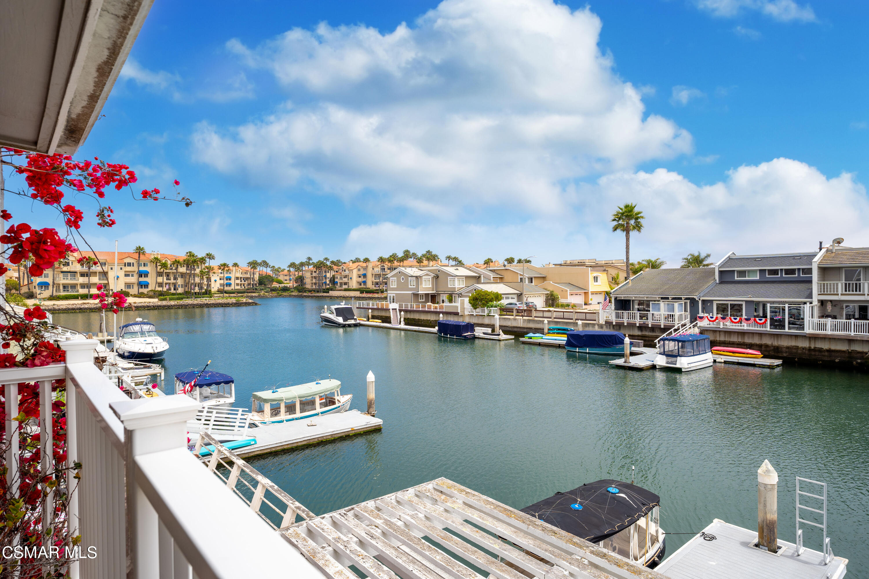 4512 Falkirk Bay Oxnard, CA 93035 - Photo 34 of 40 a view of a lake with boats and a house