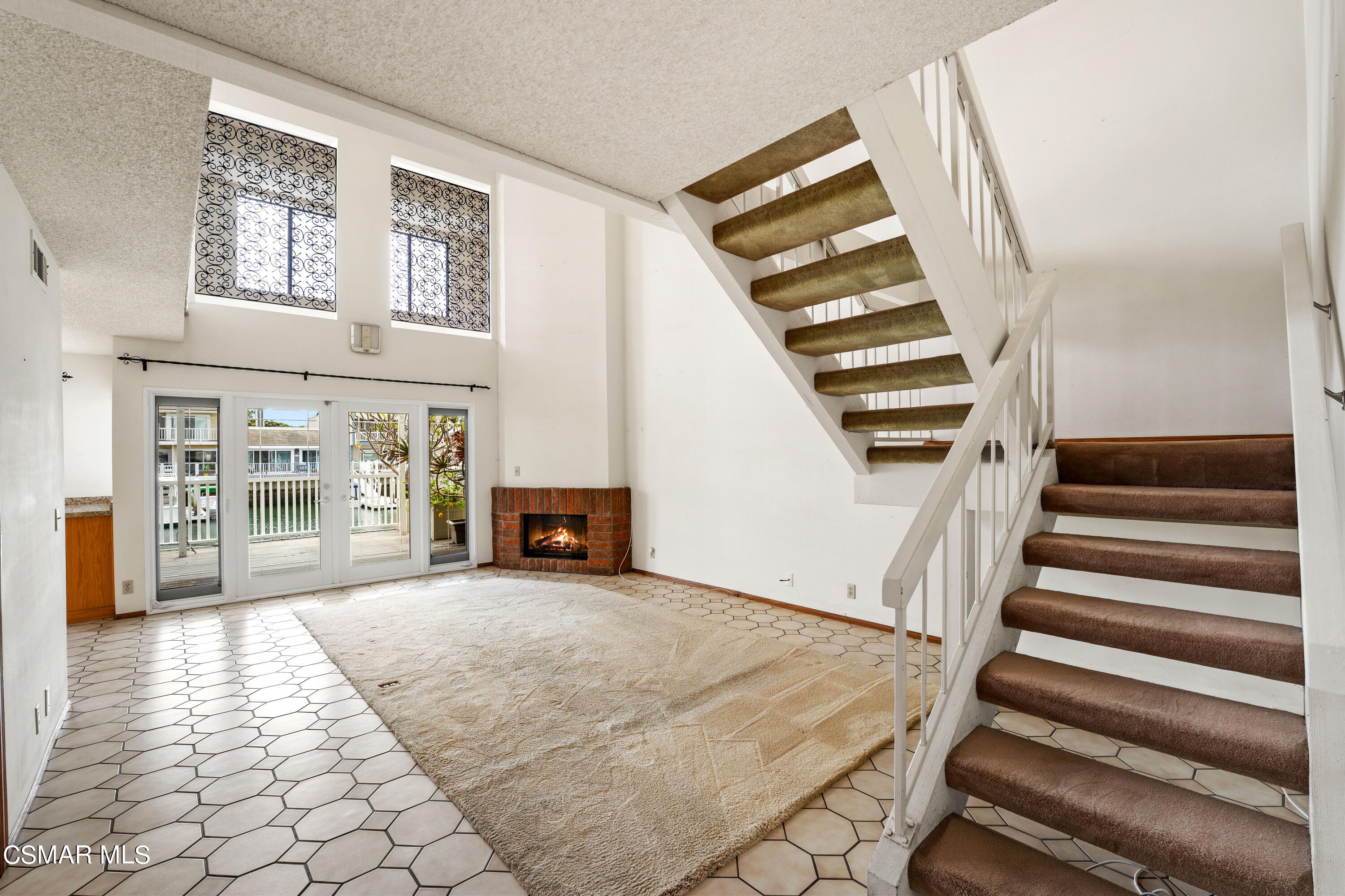 4512 Falkirk Bay Oxnard, CA 93035 - Photo 7 of 40 a view of staircase with white walls and windows