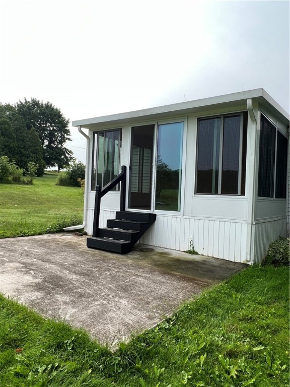 7551 Jackson School Road Lyons, NY 14489 - Photo 3 of 28 3 season room off back with patio