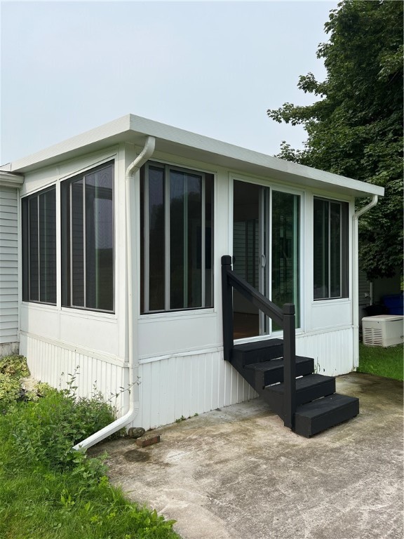 7551 Jackson School Road Lyons, NY 14489 - Photo 4 of 28 3 season room off back with patio
