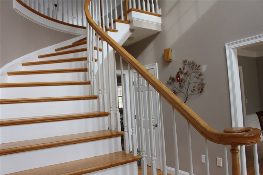 161 Chocolog Road Uxbridge, MA 01569 - Photo 12 of 37 Beautiful turned staircase leads to balcony overlooking first floor