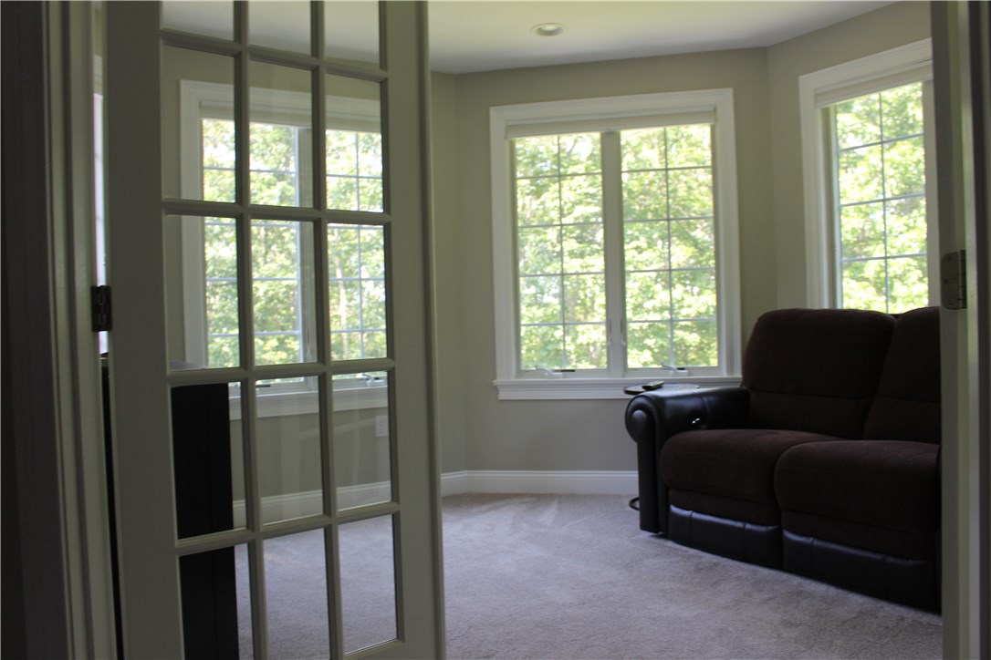 161 Chocolog Road Uxbridge, MA 01569 - Photo 15 of 37 Sitting room surrounded with windows is great to relax and stare out at the birds and local wildlife