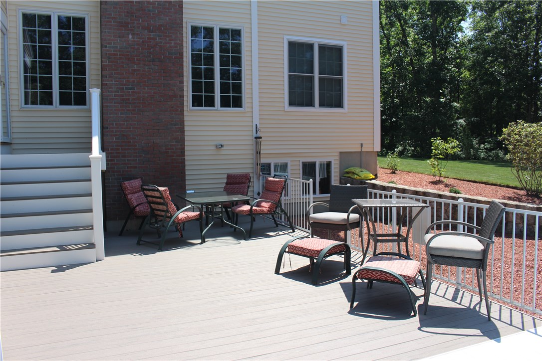 161 Chocolog Road Uxbridge, MA 01569 - Photo 32 of 37 Patio area is a nice private area for get togethers, barbecues or sunbathing and watching the kids play in the pool.
