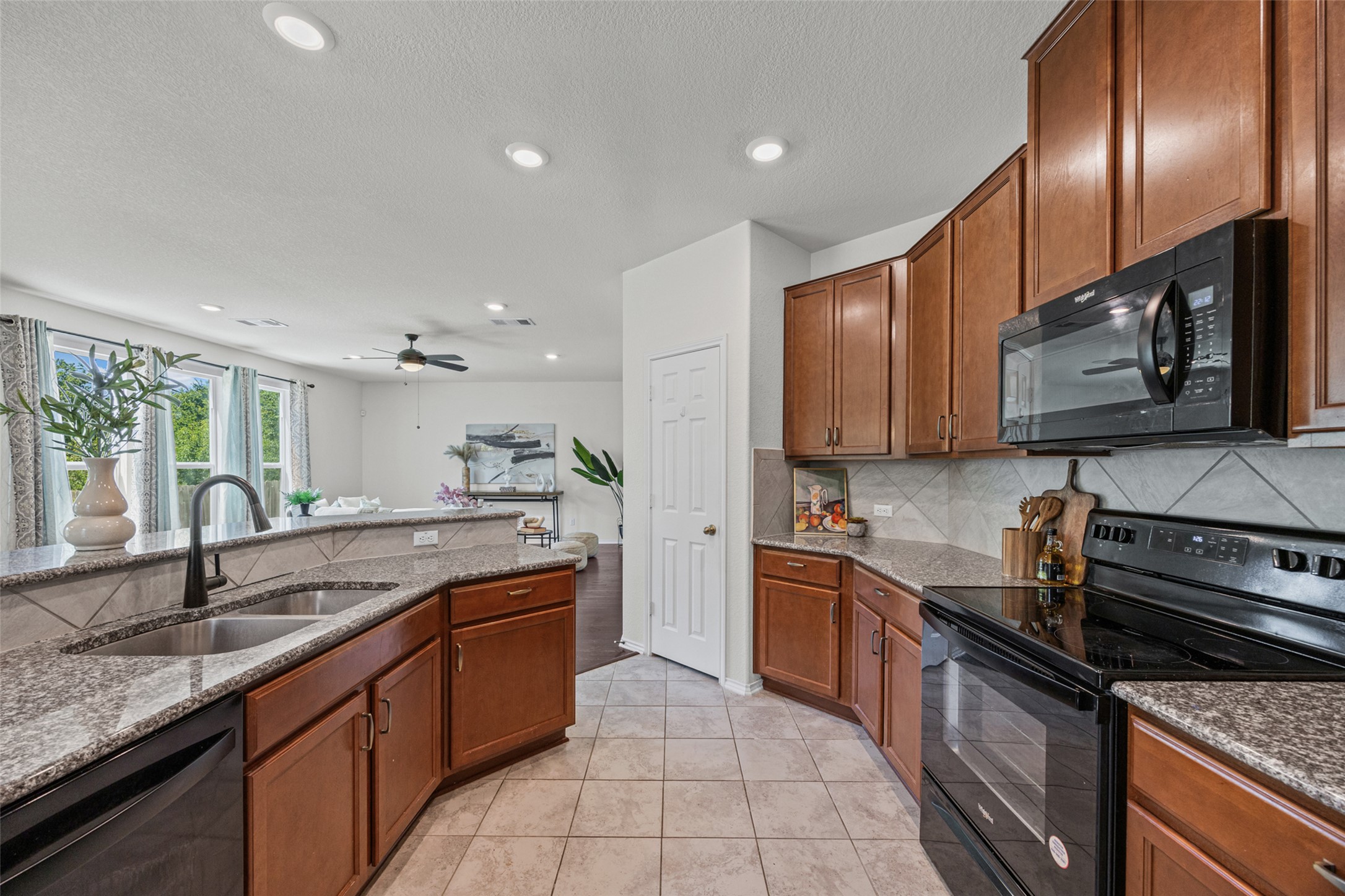 2471 Sunrise Road, Unit 64 Round Rock, TX 78664 - Photo 9 of 32 A well-appointed kitchen features ample counter space and an open-concept layout.