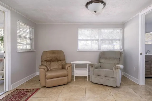 a living room with furniture and a window