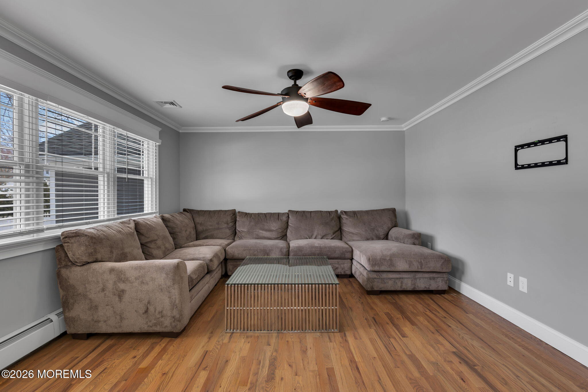 27 Branch Road Oakhurst, NJ 07755 - Photo 13 of 44 a living room with furniture and a large window