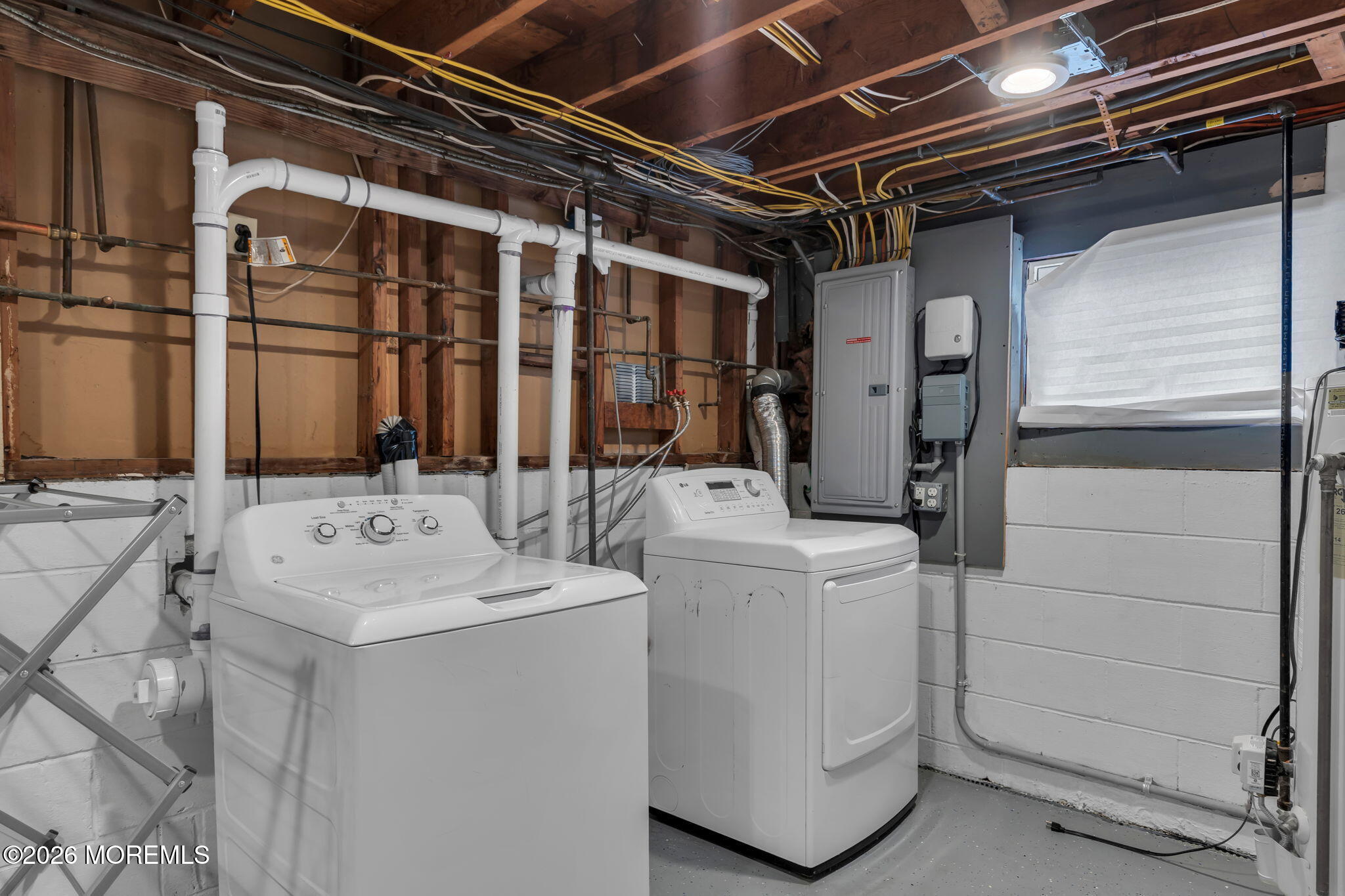 27 Branch Road Oakhurst, NJ 07755 - Photo 33 of 44 a utility room with dryer and washer