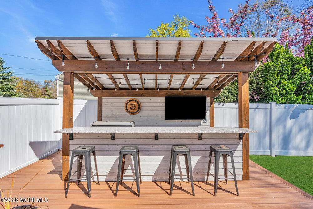 27 Branch Road Oakhurst, NJ 07755 - Photo 37 of 44 a view of a chairs and table in kitchen