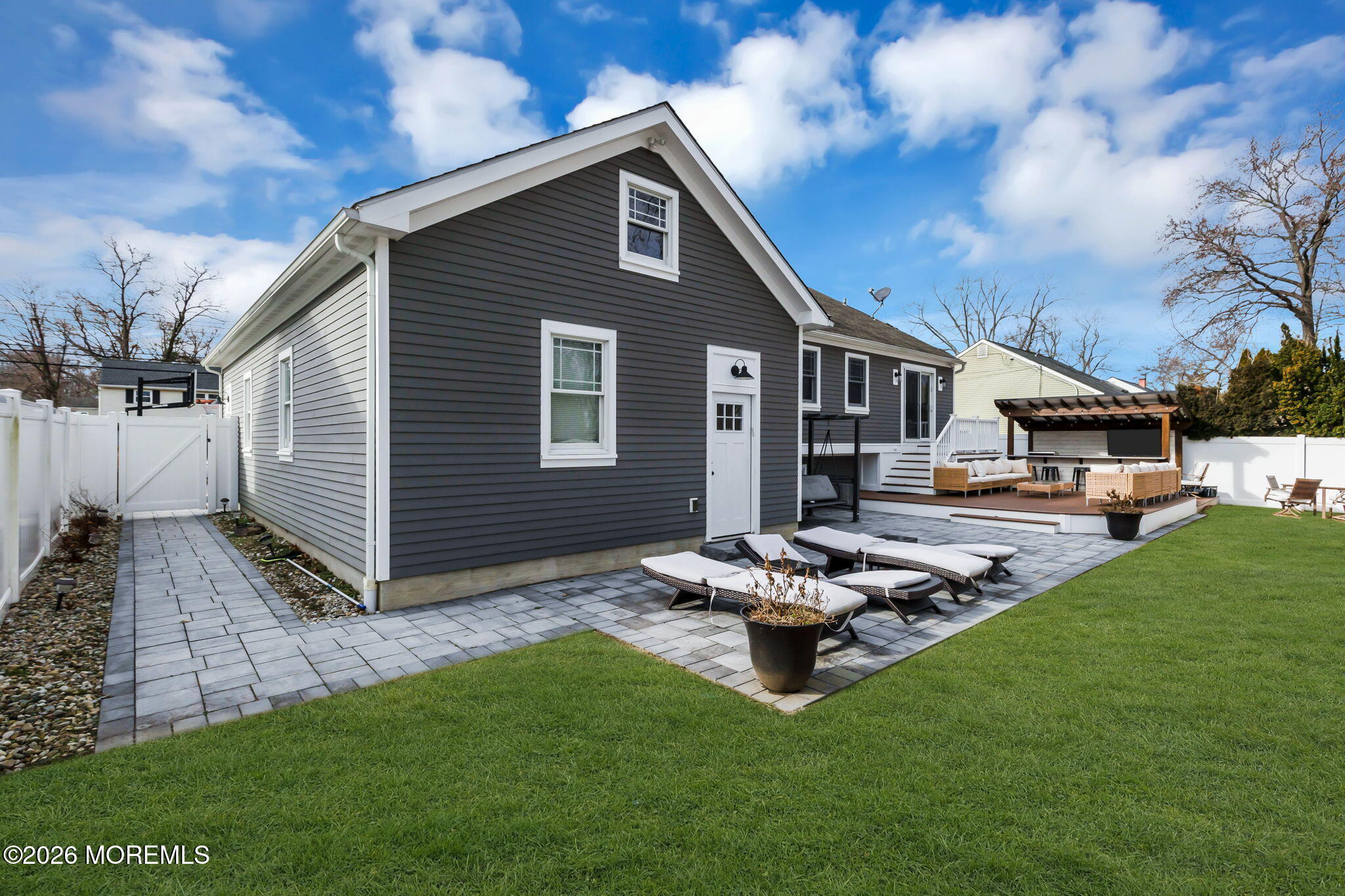 27 Branch Road Oakhurst, NJ 07755 - Photo 38 of 44 a front view of a house with garden