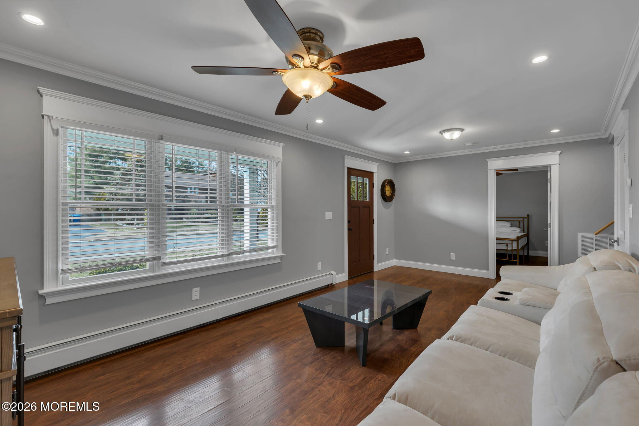 27 Branch Road Oakhurst, NJ 07755 - Photo 8 of 44 a living room with furniture and a large window
