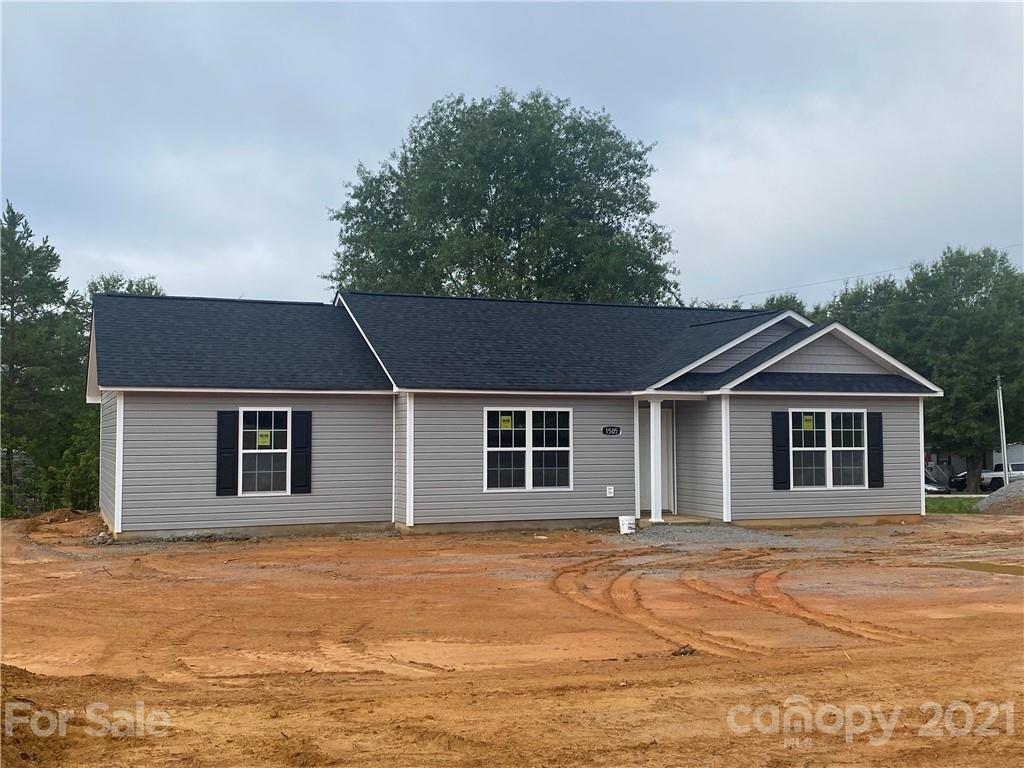 1505 Foxbrook Circle Lancaster, SC 29720 - Photo 2 of 7 front view of a house with a yard