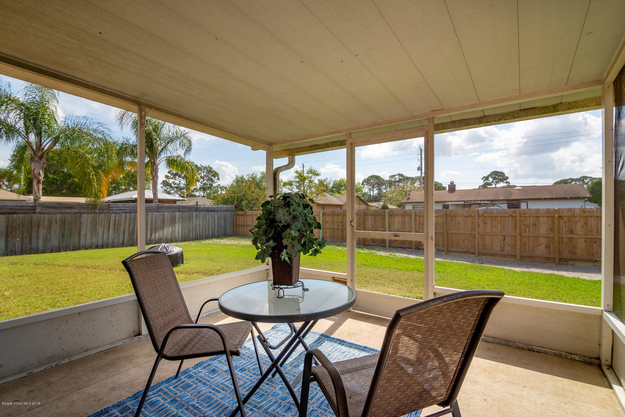 5585 Flint Road Cocoa, FL 32927 - Photo 11 of 14 a view of patio with swimming pool