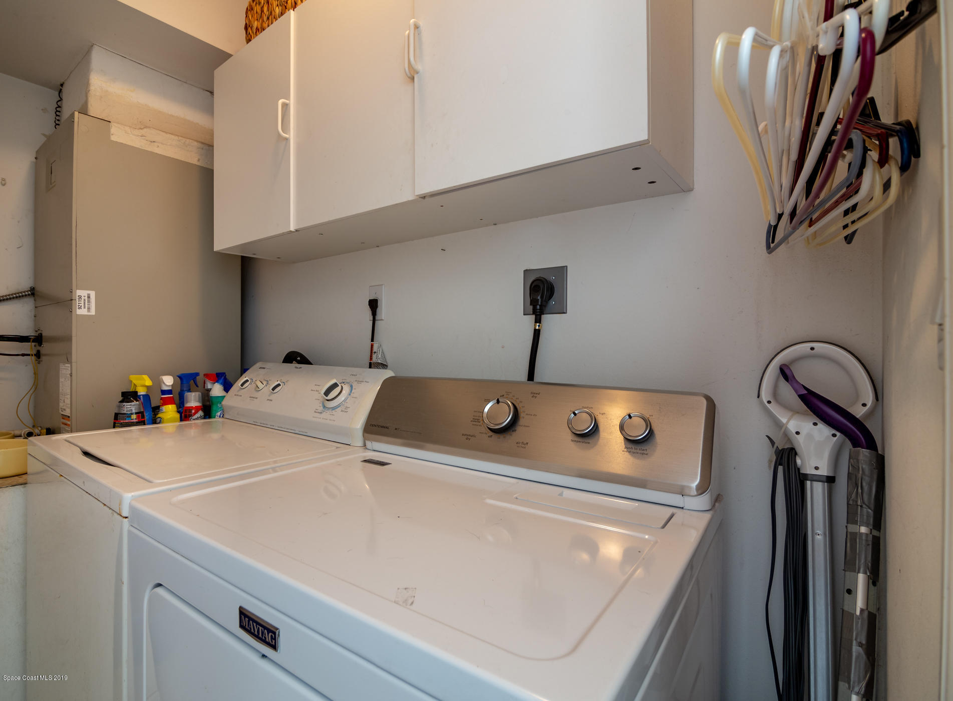 5585 Flint Road Cocoa, FL 32927 - Photo 12 of 14 a utility room with dryer and washer