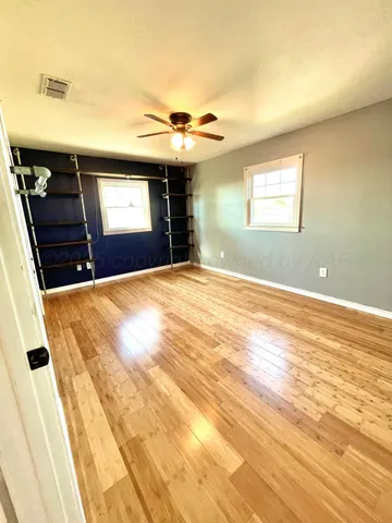 a view of a livingroom with a dresser