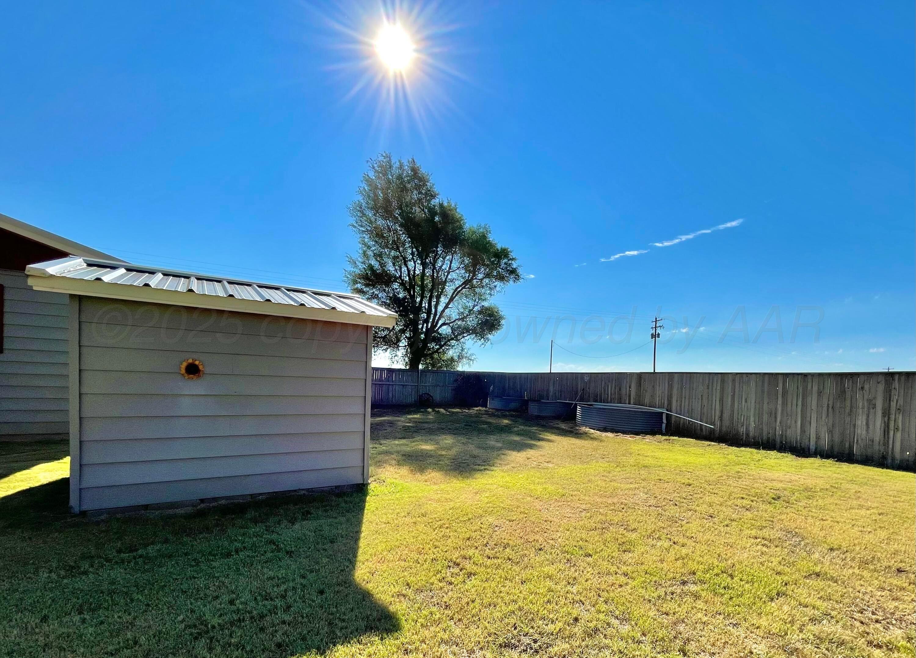 253 Fm 378 Silverton, TX 79257 - Photo 18 of 18 a view of a swimming pool with a yard