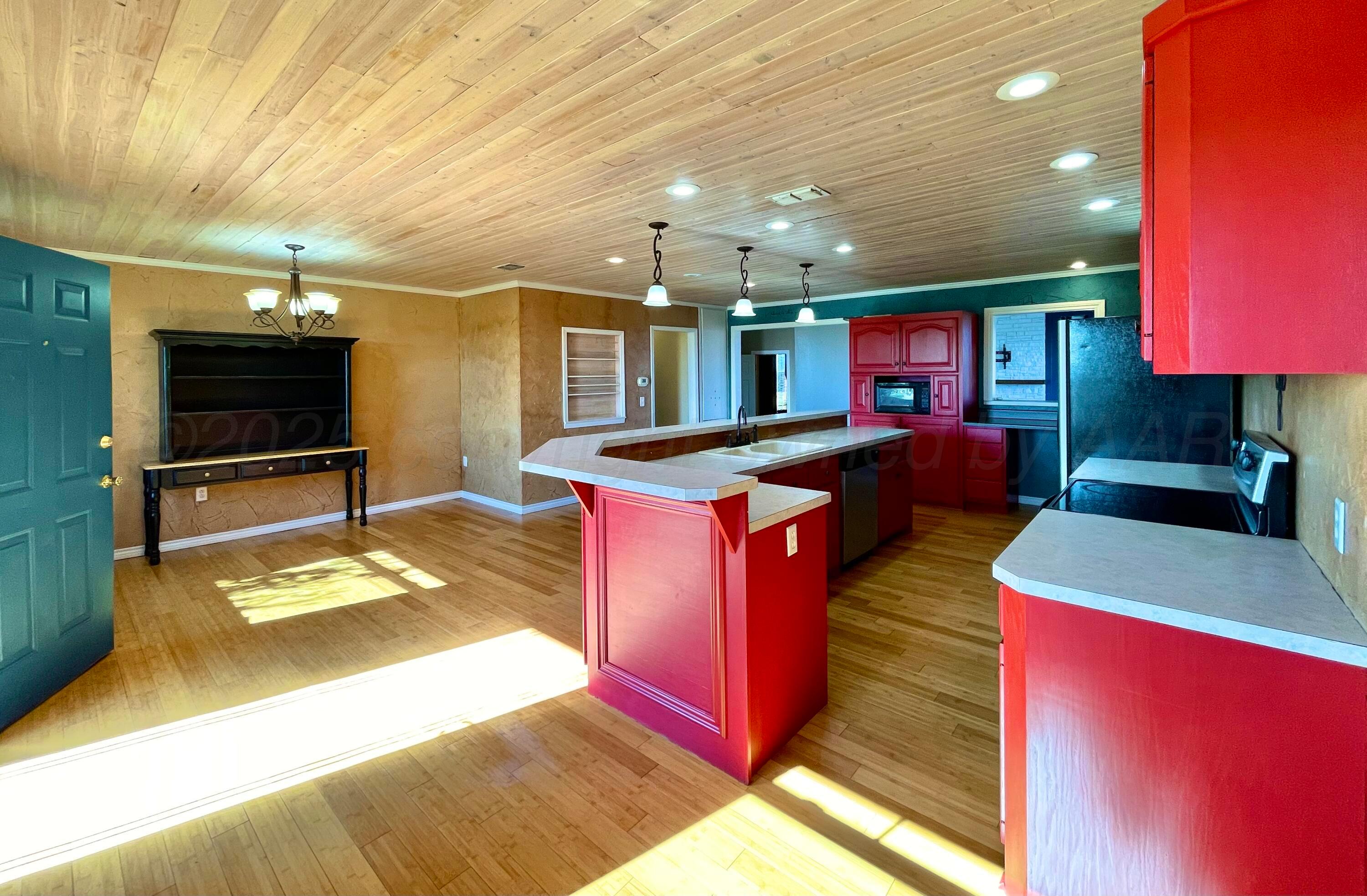 253 Fm 378 Silverton, TX 79257 - Photo 2 of 18 a kitchen with sink stove and cabinets