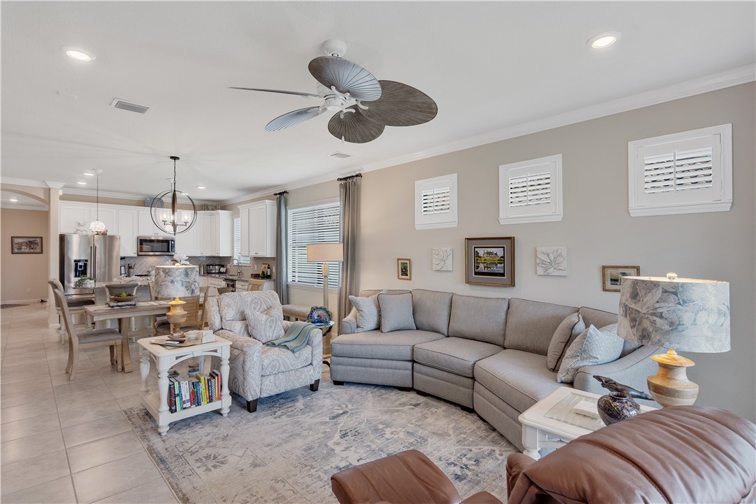 5122 Unity Square Vero Beach, FL 32967 - Photo 13 of 33 a living room with furniture and a large window