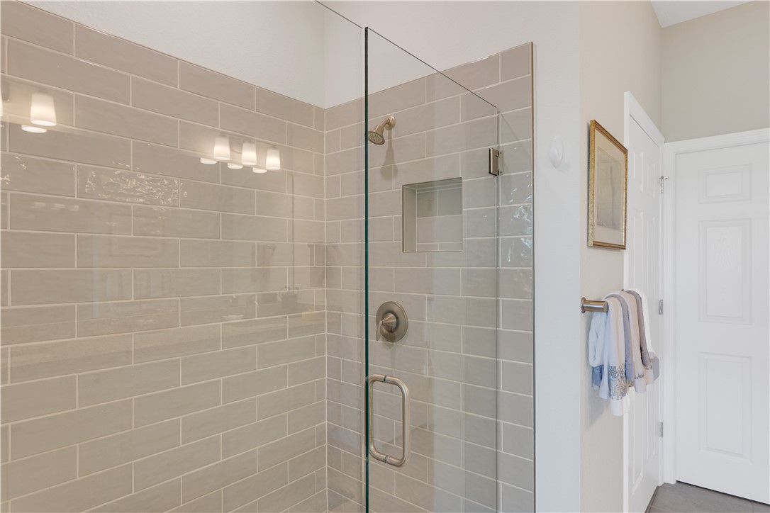 5122 Unity Square Vero Beach, FL 32967 - Photo 17 of 33 a bathroom with a shower