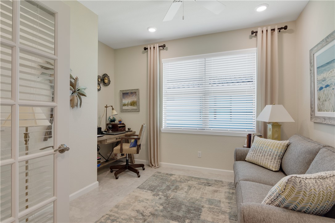 5122 Unity Square Vero Beach, FL 32967 - Photo 20 of 33 a living room with furniture and a window