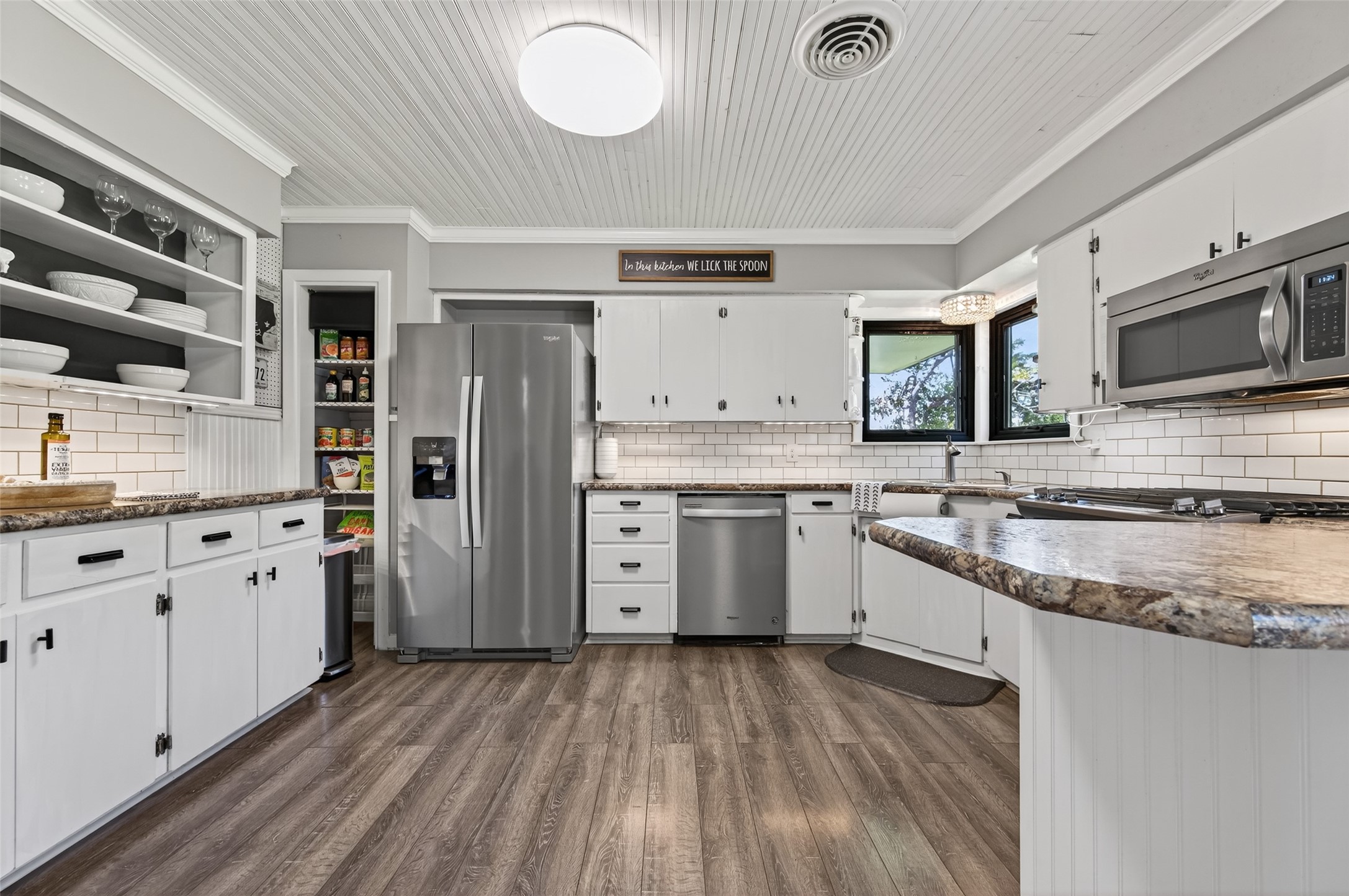 302 West Stone Street Brenham, TX 77833 - Photo 11 of 28 Kitchen with Granite Island