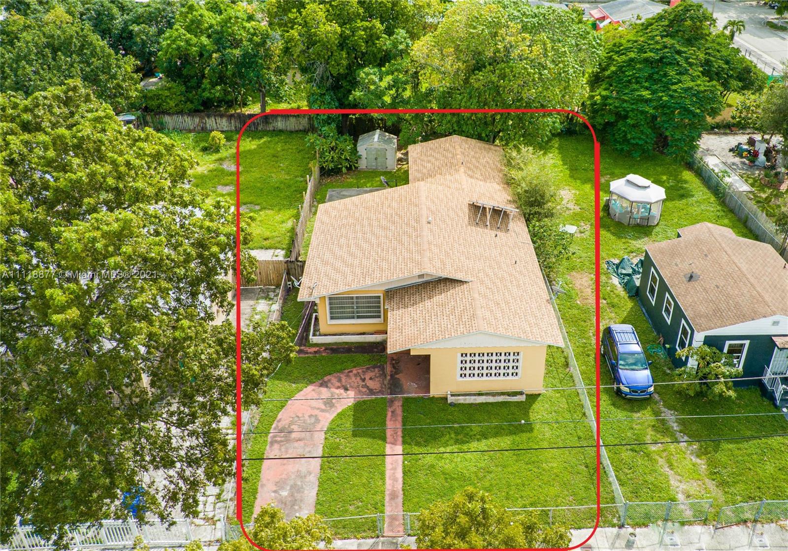 270 Northwest 50th Street Miami, FL 33127 - Photo 1 of 21 a view of a house with a yard