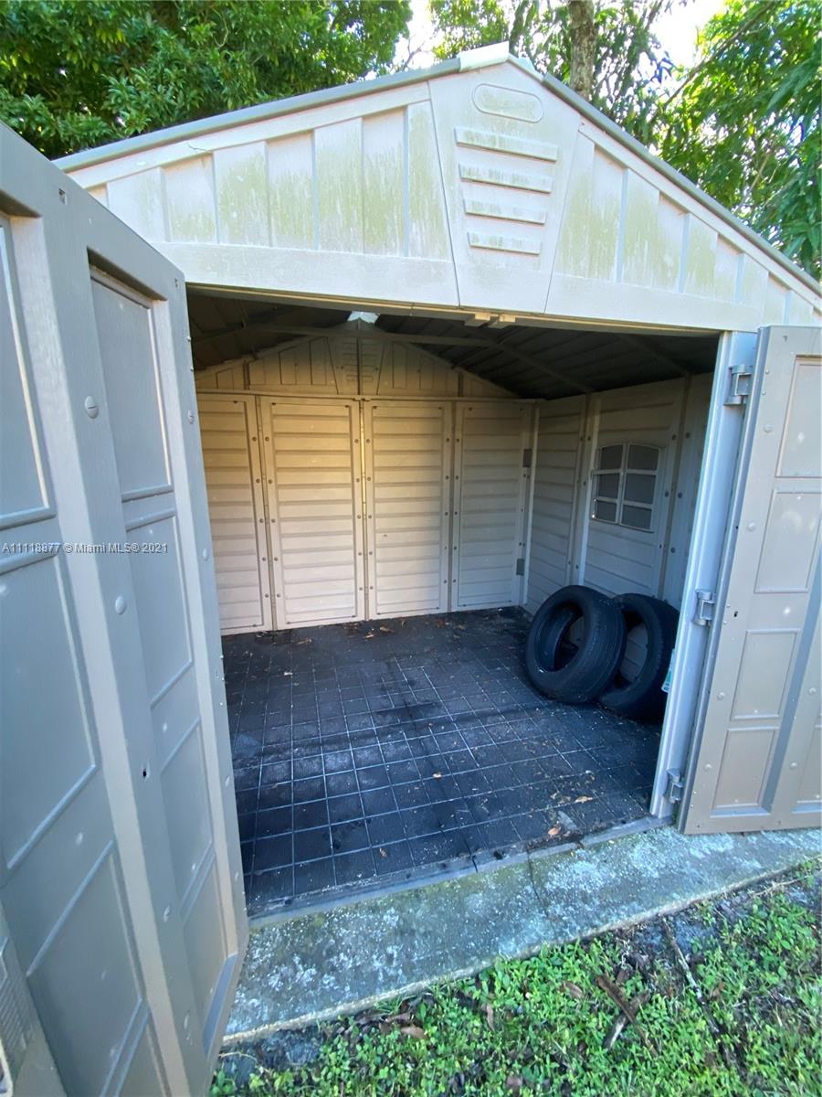 270 Northwest 50th Street Miami, FL 33127 - Photo 20 of 21 a view of small house with a sink and backyard
