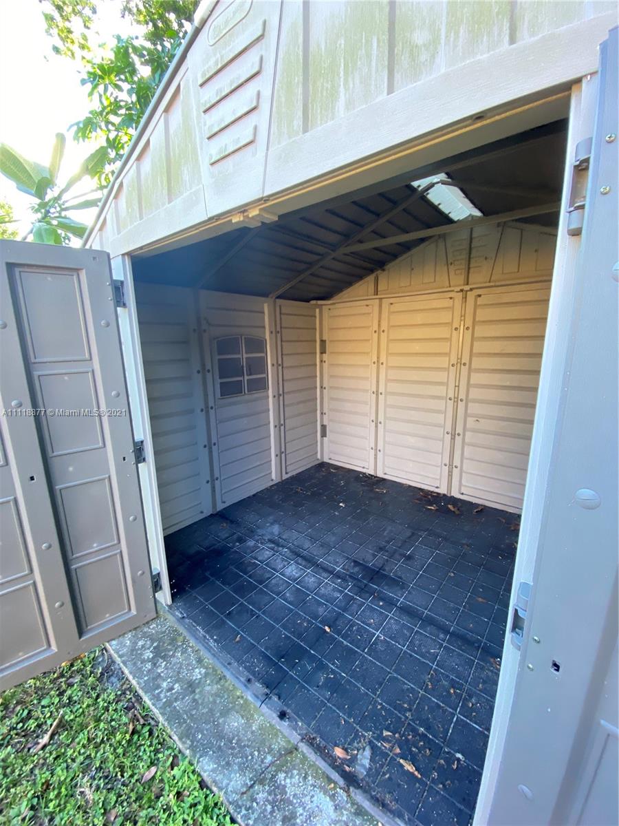 270 Northwest 50th Street Miami, FL 33127 - Photo 21 of 21 a view of a house with a door