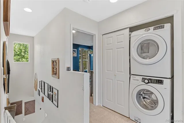 a view of hallway with washer and dryer
