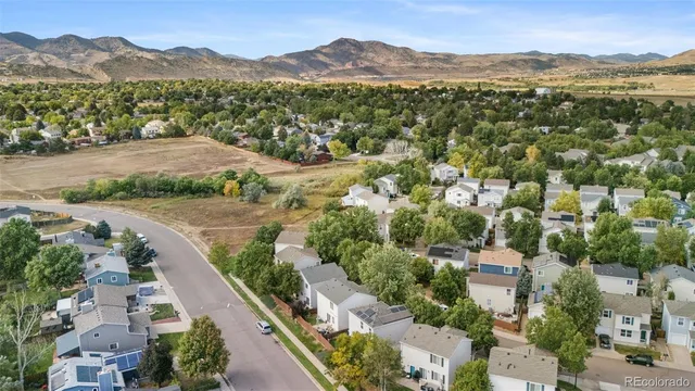an aerial view of a city with lots of residential buildings