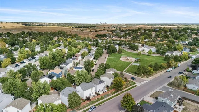 a view of city with ocean