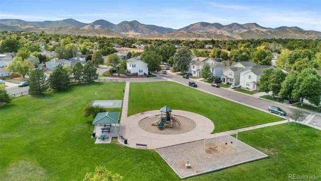 a view of a garden with a lake view
