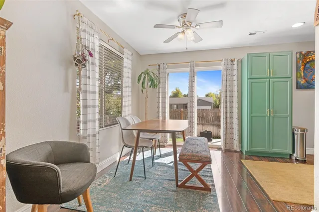 a workspace with furniture and a window