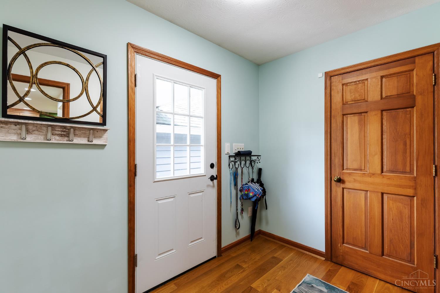 623 Ibold Road Loveland, OH 45140 - Photo 15 of 35 Designed with convenience in mind, the mudroom includes built-in storage, laundry hookups for optional first-floor laundry, direct access to the exterior, and a nearby half bath—an ideal space for everyday living.