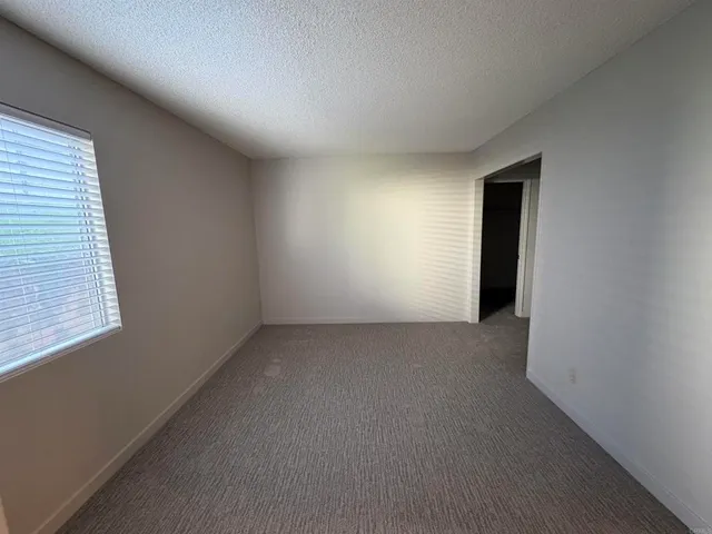 a view of empty room with front door