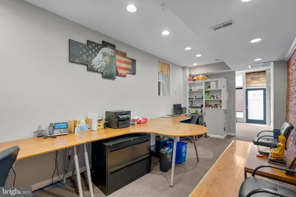 a kitchen with stainless steel appliances granite countertop a sink and a wooden cabinets