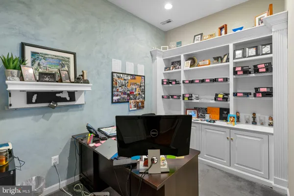a view of kitchen with furniture and large window