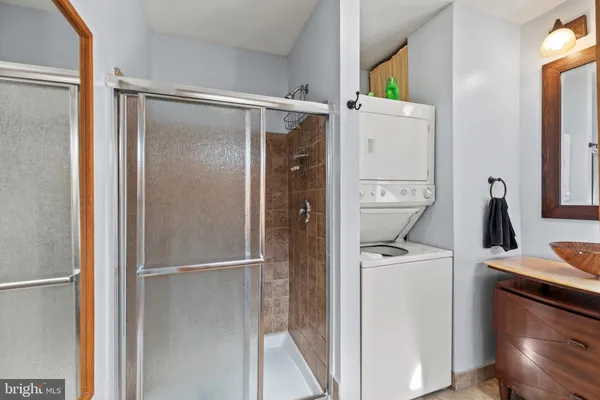 a room with furniture and a mirror