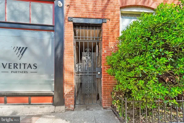 a room with furniture and wooden floor