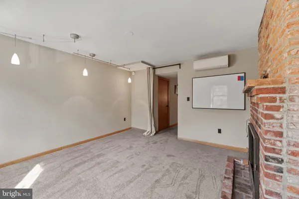 a room with furniture and a window