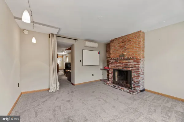 a view of an entryway with a door