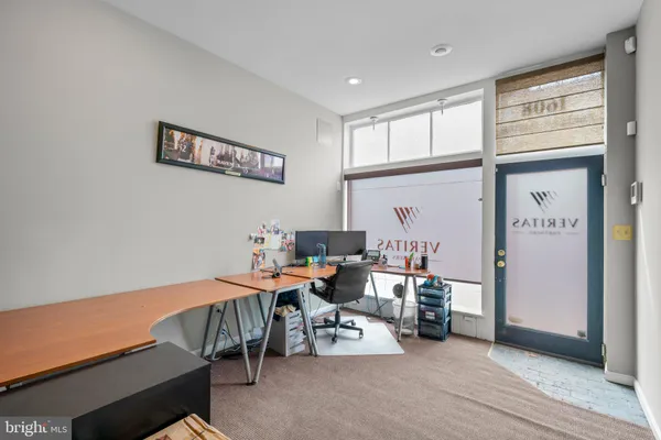a dining room with furniture