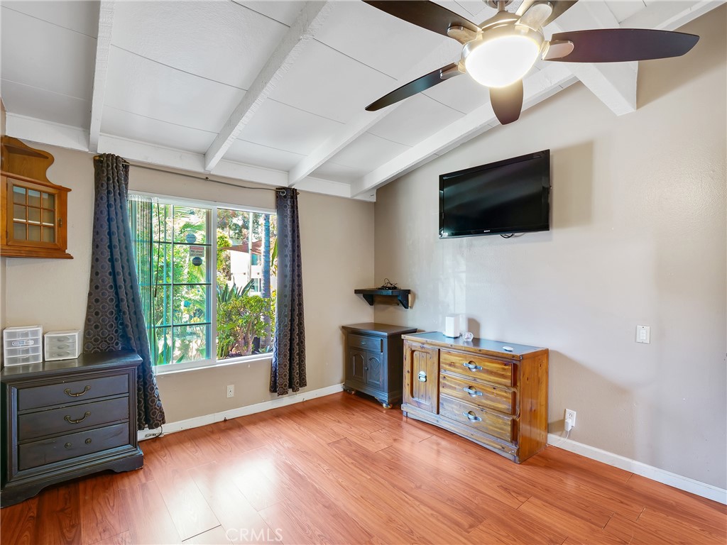 820 Raintree Place Vista, CA 92084 - Photo 16 of 29 a living room with furniture and a flat screen tv