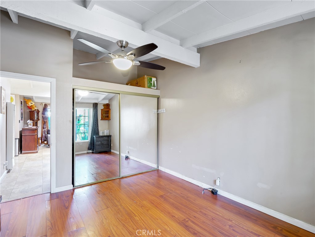 820 Raintree Place Vista, CA 92084 - Photo 17 of 29 a view of empty room with wooden floor